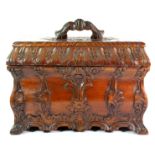 A late 19th century carved mahogany sewing box, the cover lifts off to reveal a removable tray above