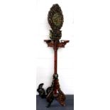 A Tibetan carved and hand painted wooden butter lamp stand, H. 186cm, A/F to legs.