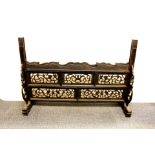 A mid 20th century Chinese carved wooden screen panel stand, W. 99cm, H. 69cm.