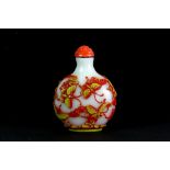 A Chinese three layer carved Peking cameo glass snuff bottle of butterflies with a carved faux coral