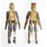 Two Chinese articulated carved wooden medical dolls, H. 35cm.