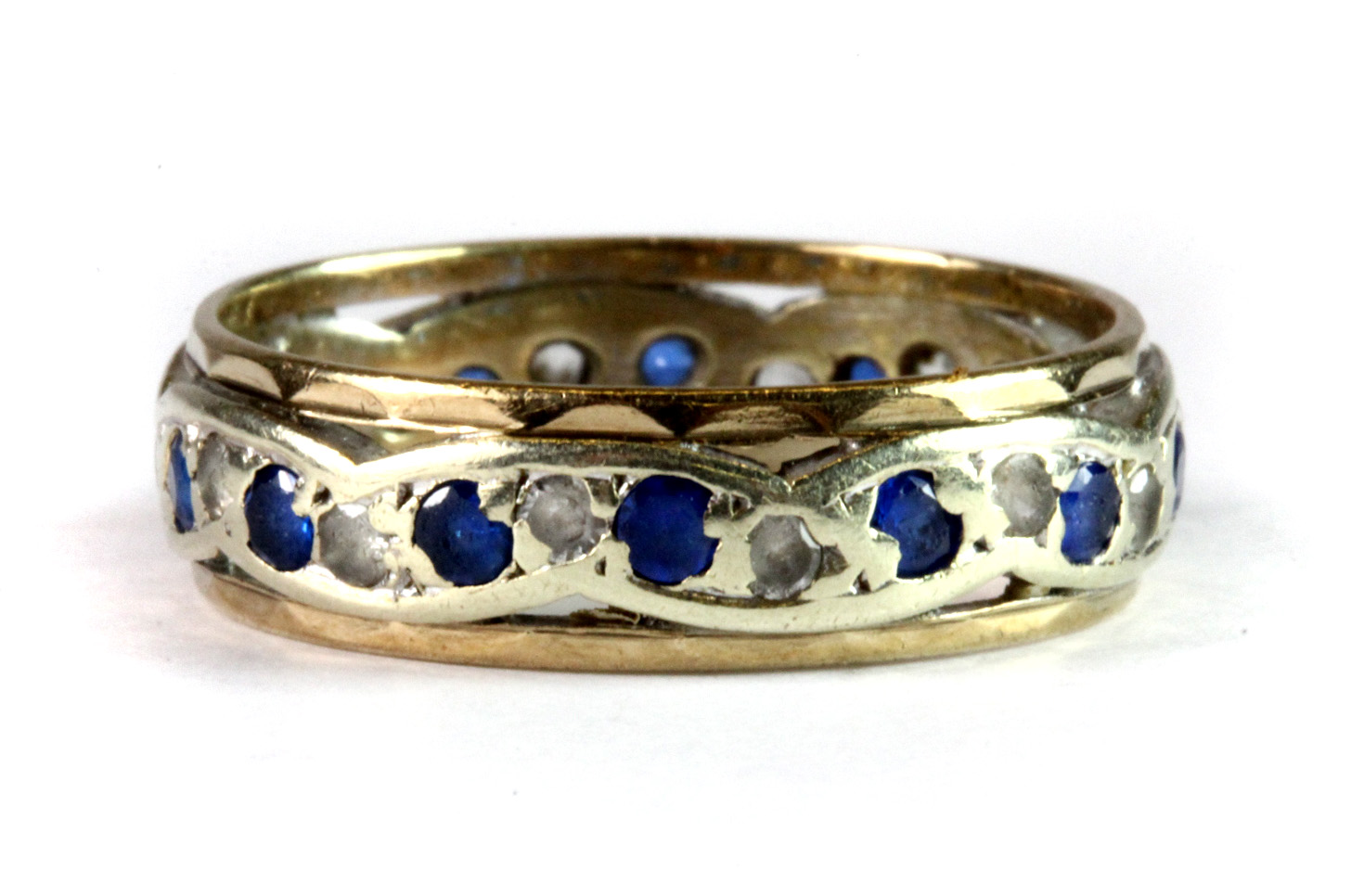 A 9ct yellow and white gold (stamped 9ct) stone set ring (L).