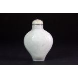 A Chinese carved mutton fat jade snuff bottle engraved with a duck and peaches, H. 5.5cm, Prov.
