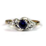 A 9ct yellow and white gold ring set with a lovely sapphire and white stones (K.5).