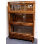 A Globe Wernicke Co. Ltd. three tier oak bookcase, 85 x 127cm, bearing original label.