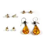 Three pairs of 9ct yellow gold earrings and a further pair of silver and amber earrings.