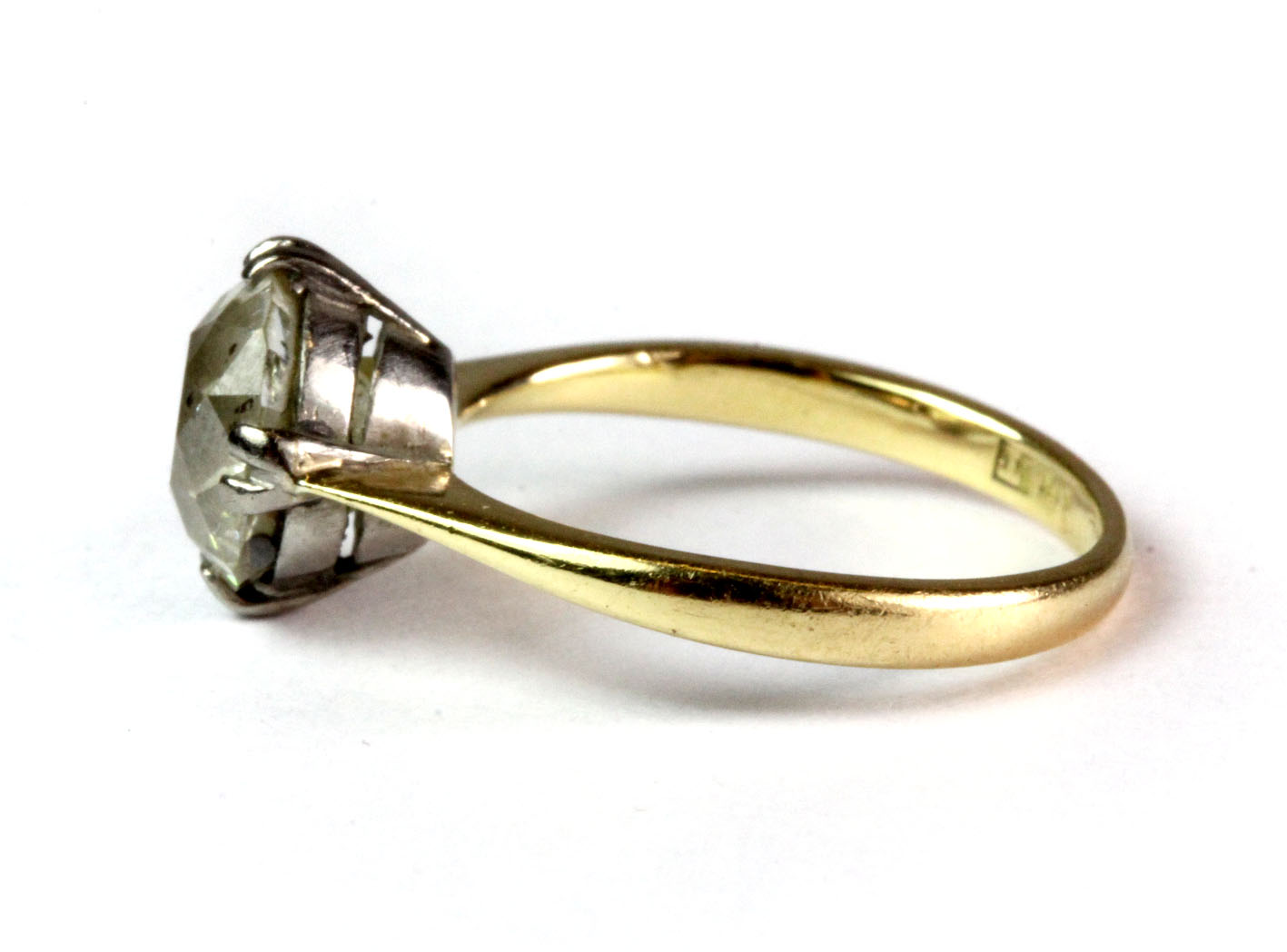 An antique 18ct yellow gold and platinum old cut diamond solitaire ring (H). Approximately 1.60ct. - Image 2 of 2