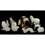 A quantity of signed Norwegian Hadeland glass animal figures and further pottery animals.