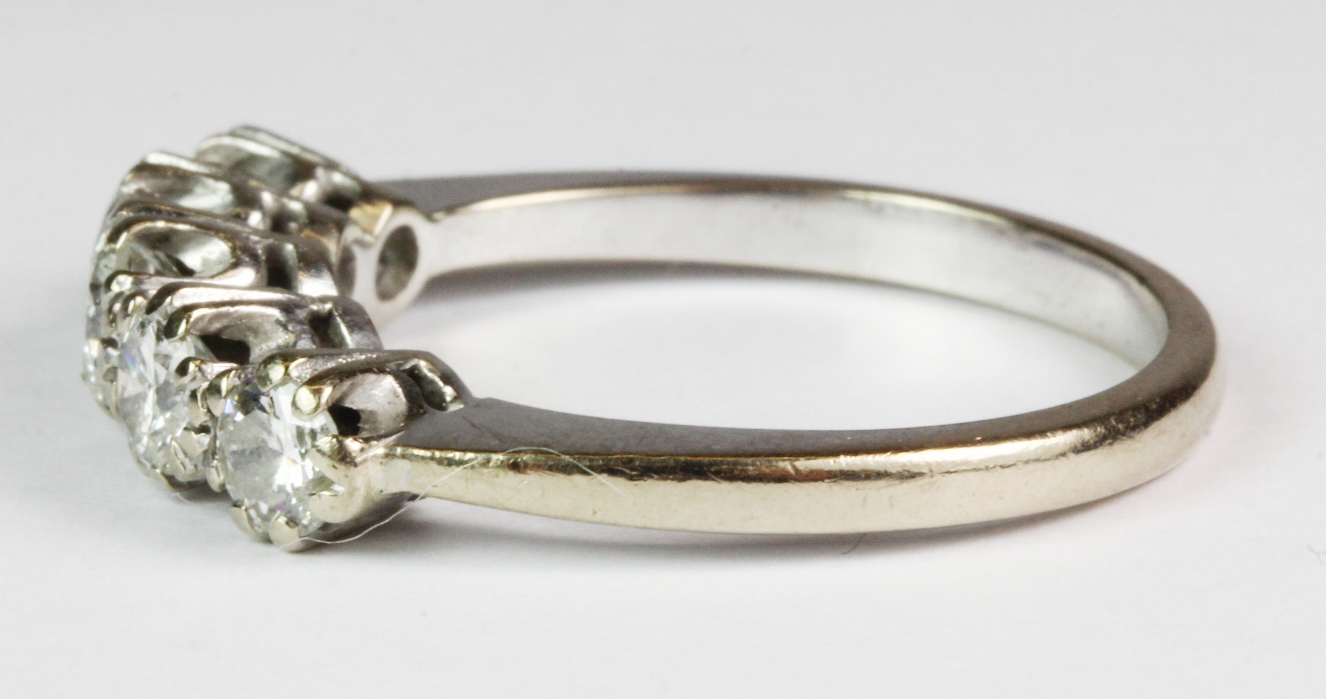 An stunning white metal (tested 18ct gold) five diamond set ring, approx 1.5ct diamnds (T). Est. £ - Image 2 of 2