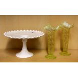 A 19th century American milk glass tazza (Dia. 24cm) and pair of 19th century Vaseline glass vases.