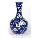 A 19th century Chinese hand painted porcelain vase, four character mark to base, prunus pattern (