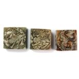 Three early 20th century Chinese carved soapstone seals, 4 x 4 x 2.5cm & 4 x 4 x 4cm.