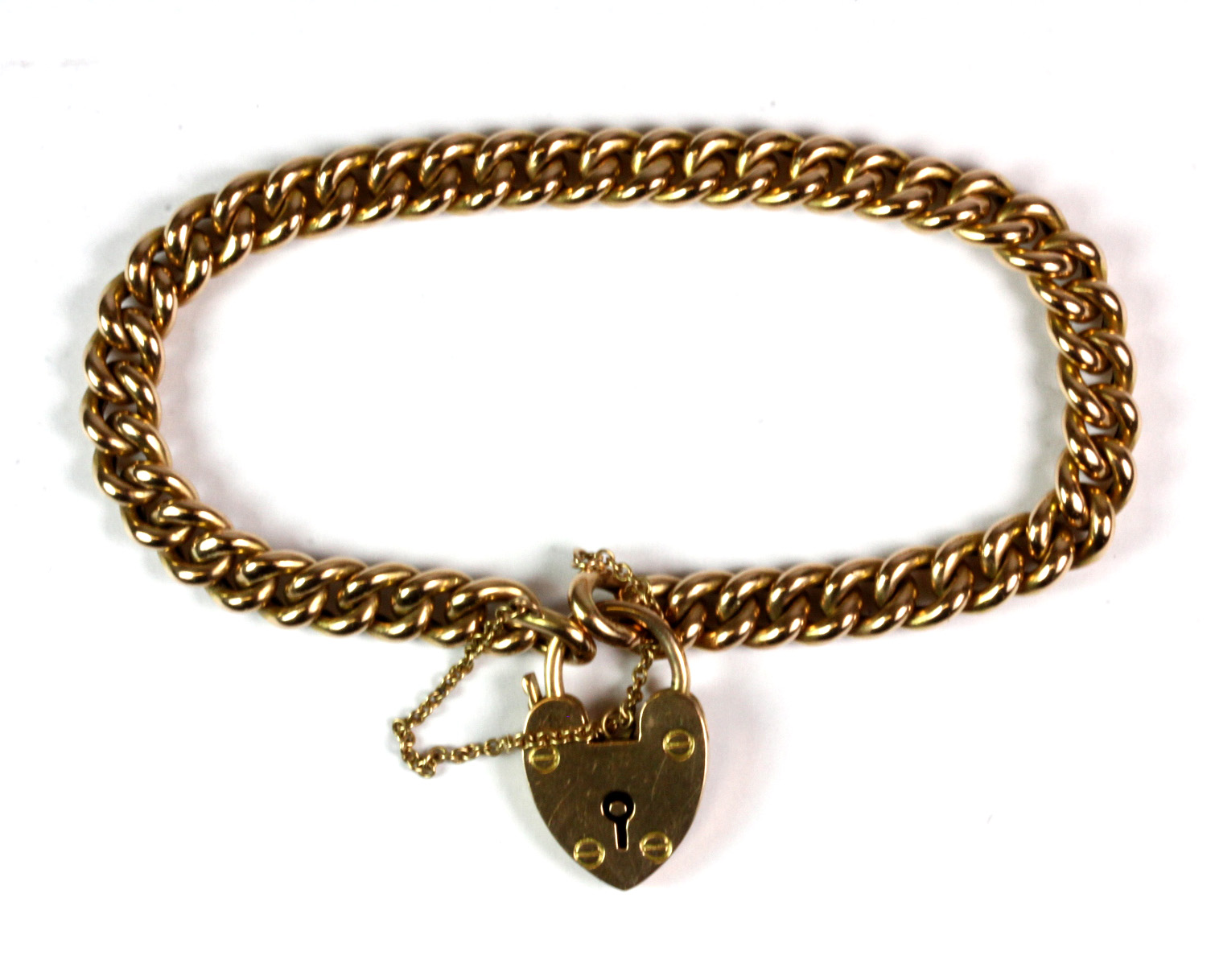 A 15ct yellow gold (stamped 15ct) link bracelet with a heart shaped clasp (approx. 13.8gr).