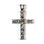 A 9ct white gold stone set cross pendant.