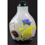 A Chinese carved mixed colour Peking cameo glass snuff bottle, H. 6cm.