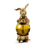 A 9ct yellow gold stone set rabbit pendant (approx. 6.8gr). Est. £80-100.