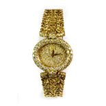 A lady's Le Montre Royale 18ct yellow gold diamond set wristwatch (approx. 60.1gr). Est. £1,600-£2,