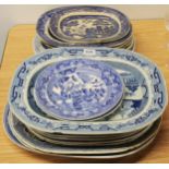 A quantity of Victorian blue and white meat plates, etc.