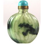 A rare 19th / early 20th century Chinese melon shaped jade snuff bottle with a natural dragon head