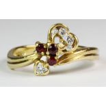 A lovely 18ct yellow gold (stamped 750) ruby and diamond set ring (M.5).