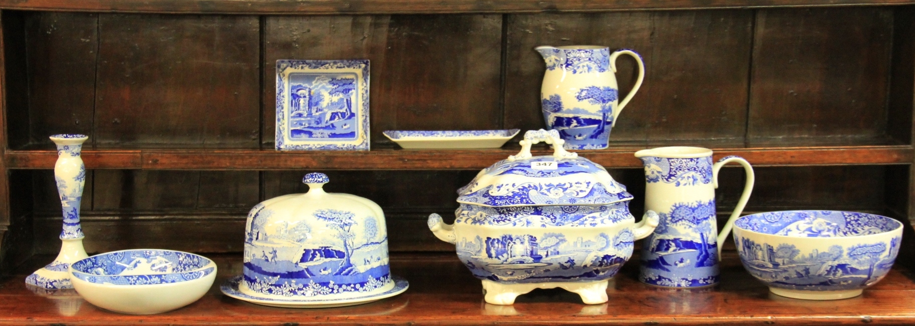 A Spode Italian pattern tureen, Stilton dish, two jugs and five other items.