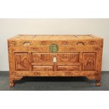 A carved Chinese pine linen chest, 87 x 41 x 46cm.