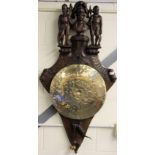 A large 19th century Austrian carved oak armorial wall mounted decoration featuring a later brass