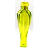 An early 20th century uranium glass snuff bottle with Murano style glass stopper, L. 8cm.