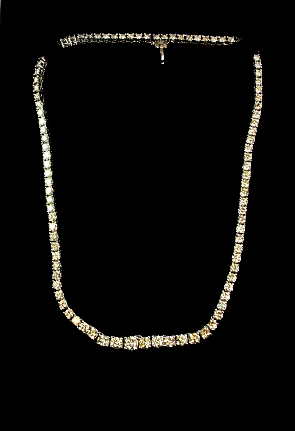 An 18ct white gold graduated diamond necklace, set with approx. 18.35ct of diamonds. Est. £7,000 - - Image 2 of 4