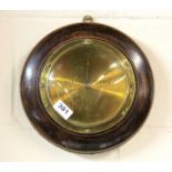 A 1920's oak and brass barometer, Dia. 28cm.