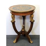 A French ormolu mounted and burr veneered mahogany table with painted decoration to top simulating