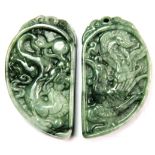 A pair of Chinese carved jadeite jade amulets of a dragon and phoenix (usually given as lovers