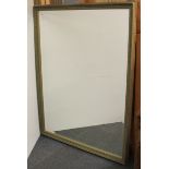 A large framed bevelled mirror, 100 x 130cm.