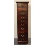 A ten drawer contemporary mahogany chest, W. 40cm, H. 135cm.
