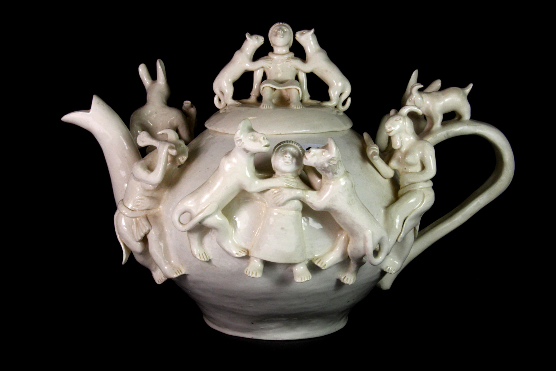 A rare South African Ardmore cream pottery glazed teapot by Nhlanhla Nsudwane (H. 29cm), spout to