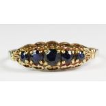 An antique 9ct yellow gold sapphire set ring (N.5).