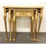 A nest of three gilt and mirror topped tables, 60 x 42 x 56cm.