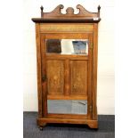 A pretty Edwardian inlaid mahogany music cabinet, W. 58cm, H. 115cm.