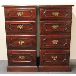 A pair of four drawer contemporary mahogany chest of drawers, H. 102cm, W. 50cm.