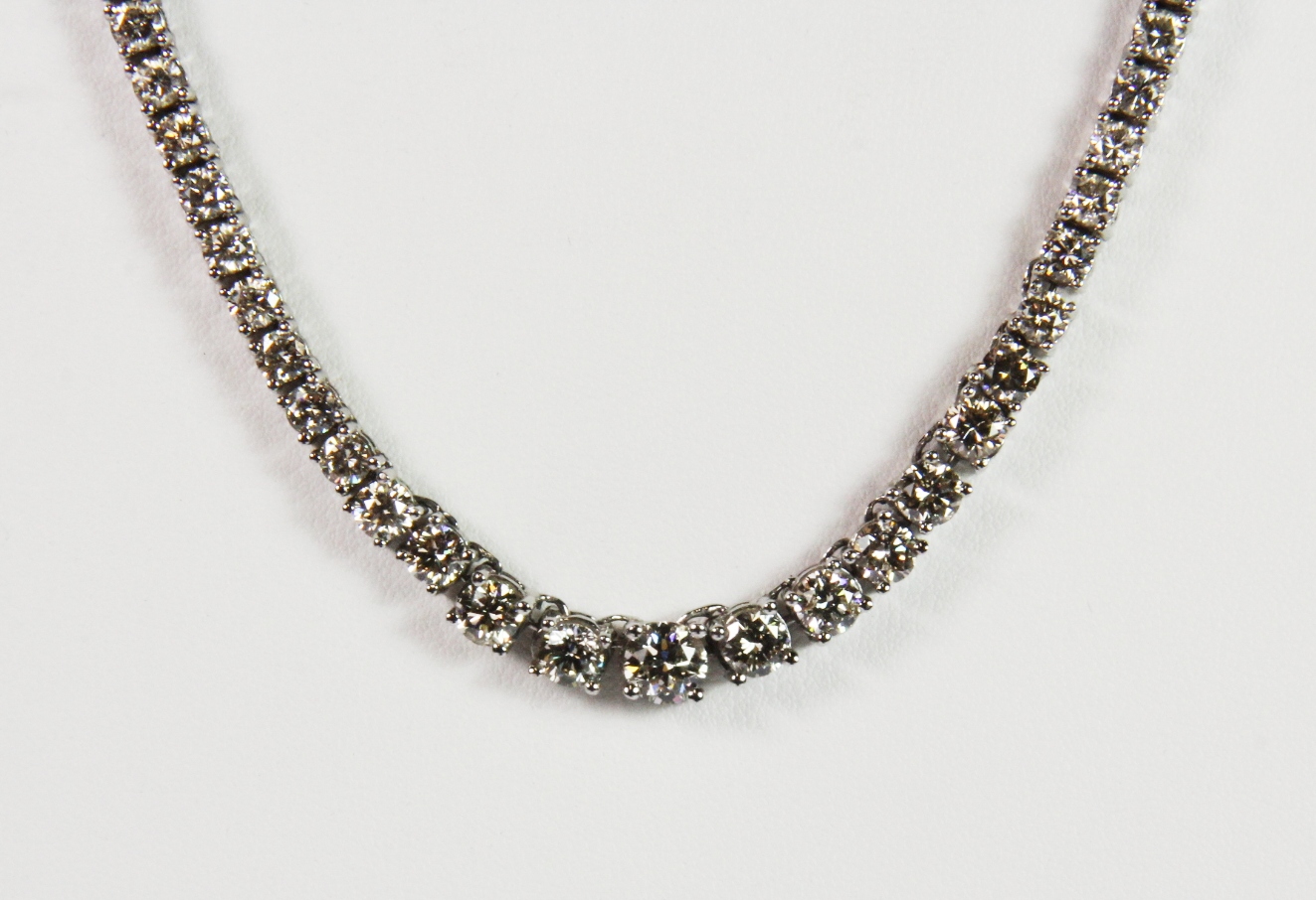 An 18ct white gold graduated diamond necklace, set with approx. 18.35ct of diamonds. Est. £7,000 - - Image 4 of 4