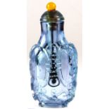 A unusual Chinese tanzanite coloured Peking glass snuff bottle, H. 7cm.