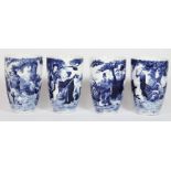 A set of four Chinese blue and white decorated porcelain beakers, of tapering conical form,