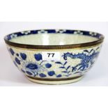 An 18th / early 19th century Chinese crackle glazed "bronze banded" bowl with hand painted blue