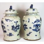 A pair of Chinese blue and white glazed porcelain jars and covers, decorated with still life scenes,