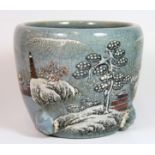 An interesting mid 20th century Chinese crackle glazed porcelain planter with winter landscape