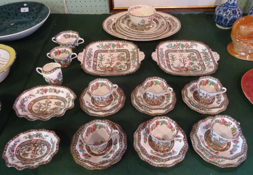 A Coalport Indian Tree part-dinner service, comprising: six trios, sugar bowls,