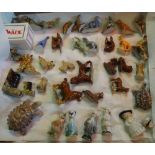 A large quantity (circa 40 pieces) of Wade Whimsies, to include: dinosaurs, dogs, horses, tortoises,