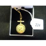 A half sovereign on a 9ct gold chain and mount, set with ten small diamonds, commemorating the