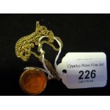 An 1893 sovereign on a 9ct gold chain and mount. Condition Report: 16.5g