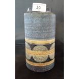 A Troika cylindrical vase, signed to base 'AJ' for Ann Jones (20cm). Condition Report: No chips,